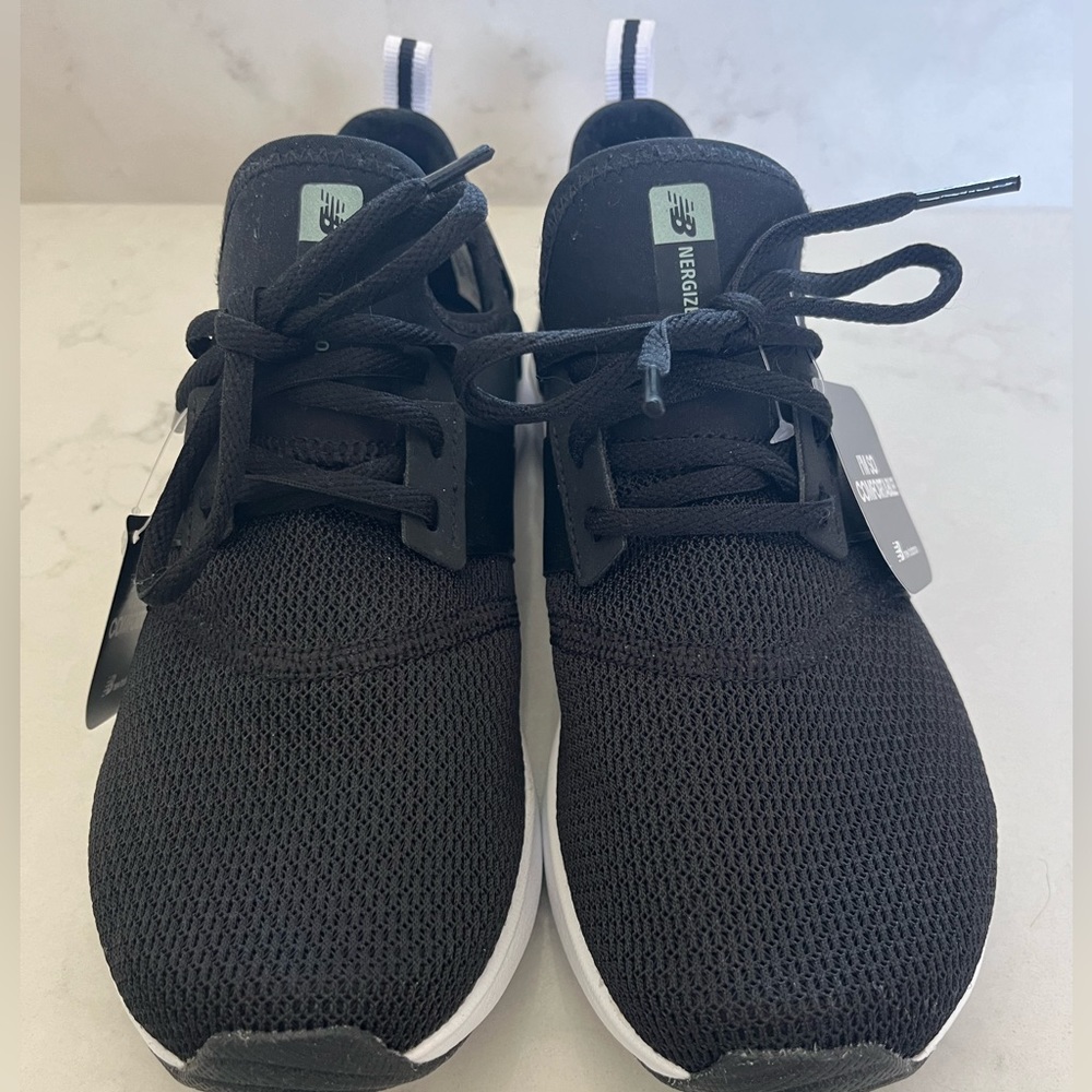 New Balance athletic shoes, brand new, never worn, US women size 8